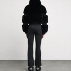 Women's Aspen ski suit in black, back view