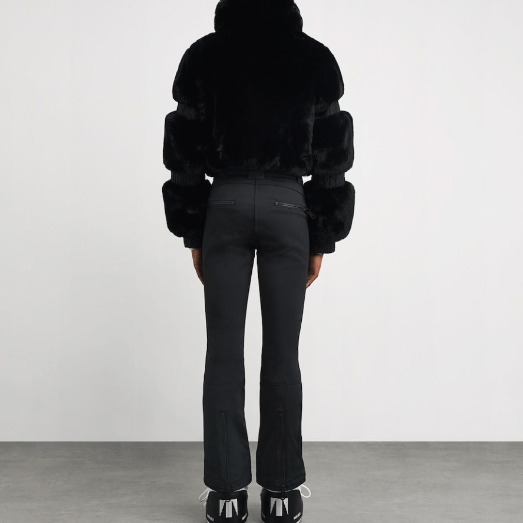 Women's Aspen ski suit in black, back view