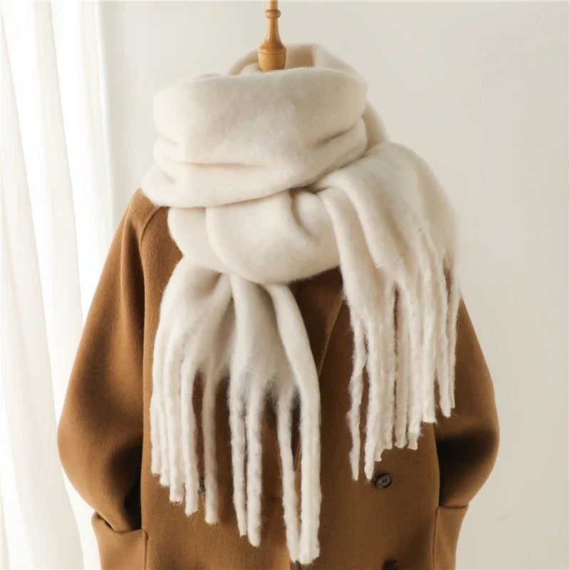 Cashmere scarf worn knotted around the neck