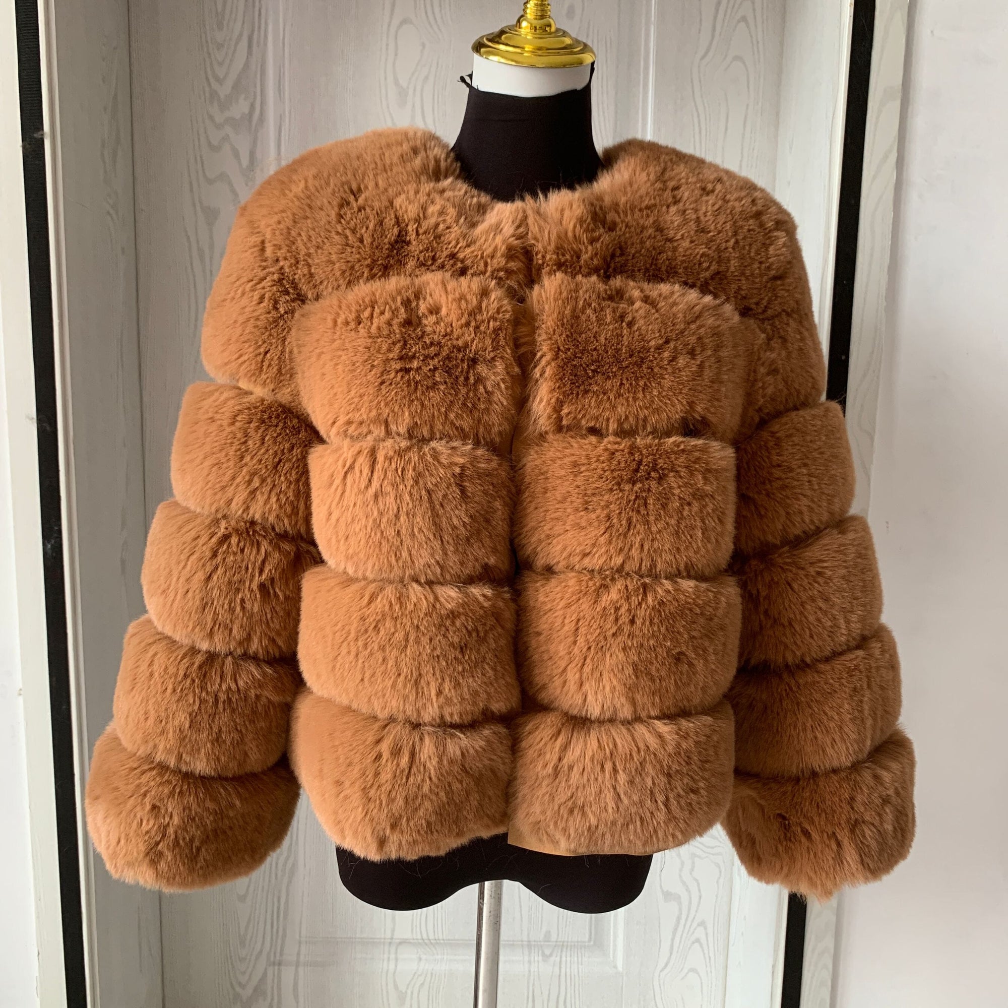 Close-up of the long pile on the women's faux fur coat