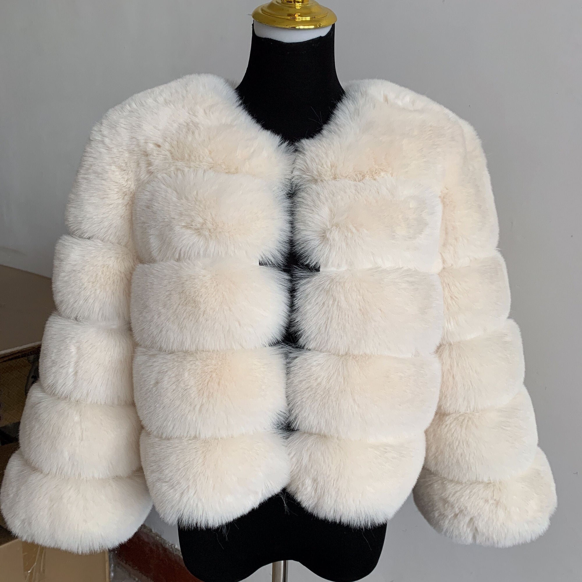 Women's faux fur coat in black, back view